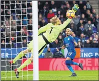  ??  ?? VOLLEY GOOD: Mahrez gives Leicester the lead