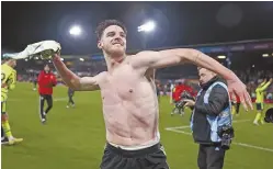  ?? ?? Declan Rice celebrates after scoring the winner in Arsenal’s dramatic 4-3 victory over Luton Town in the Premier League on 5 December, 2023.