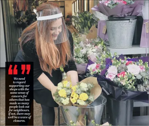  ?? PICTURE: OWEN HUMPHREYS/PA ?? OPEN FOR BUSINESS: Florists were among the non-essential shops that were able to reopen their doors yesterday, as retailers sought to return to normal.