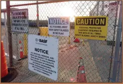  ?? ?? A gate at the entrance to the former Ciba Geigy chemical plant is filled with warnings Jan. 24 regarding the contaminat­ed area, which is on the Superfund list of the nation’s worst toxic waste sites.