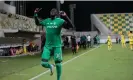  ?? Villarreal. Photograph: Petros Karadjias/AP ?? Abdoulaye Seck celebrates after giving Maccabi Haifa a surprise lead against