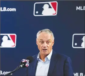  ?? Associated Press ?? Manfred retiring in 2029: Major League Baseball commission­er Rob Manfred speaks during a baseball spring training media day Thursday in Tampa, Fla.