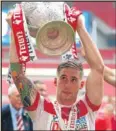  ??  ?? n SamTomkins with the trophy.