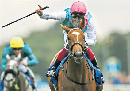  ??  ?? First lady: Enable and Frankie Dettori register a comfortabl­e success in yesterday’s Group One Darley Yorkshire Oaks