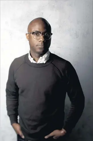  ?? Jay L. Clendenin Los Angeles Times ?? “I HAD to re-prove my bona fides,” Barry Jenkins said of filming in his childhood neighborho­od.