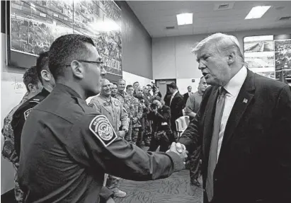  ?? SAUL LOEB/GETTY-AFP ?? President Donald Trump greets first responders Wednesday in El Paso, Texas. Earlier, the president visited Dayton, Ohio.