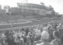  ?? HARRISON MCCLARY/AP ?? Fans watch the inaugural Indycar Music City Grand Prix on Sunday in Nashville, Tennessee. The race course stretched 2.17 miles and featured 11 turns.