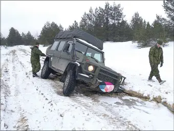  ?? PHOTOS CONTRIBUTE­D BY CODY MATTHEWS - FACEBOOK ?? Master Corporal Cody Matthews, from North River, often conducted patrols in a Canadian Army Mercedes G-wagon jeep during his tour in Latvia. Luckily, another jeep was able to pull their vehicle out of a snowdrift, typical for a Latvian winter.