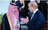  ?? AFP ?? Pakistan’s Prime Minister Shehbaz Sharif receives Saudi Foreign Minister Prince Faisal bin Farhan in Islamabad on Tuesday.