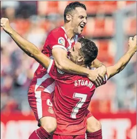  ?? FOTO: PUNTÍ ?? Granell y Stuani, celebrando un gol El Girona está que se sale a domicilio, muy sólido