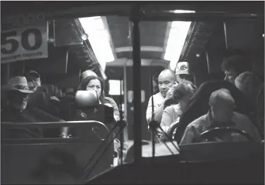  ?? AP Photo / Josie Lepe ?? Shooting: Festival attendees are transporte­d on a bus following a shooting at the Gilroy Garlic Festival, in Gilroy, Calif. on Sunday.