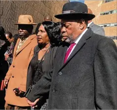  ?? ADRIAN SAINZ/ASSOCIATED PRESS ?? Attorney Ben Crump (left); Tyre Nichols’ mother, Rowvaughn Wells; and stepfather, Rodney Wells, exit the courthouse Friday in Memphis, Tennessee. Five former Memphis police officers pleaded not guilty Friday in the violent arrest and death of Nichols.