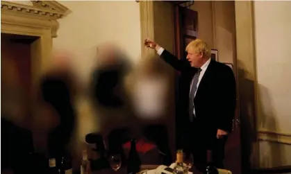  ?? ?? Boris Johnson is pictured in 10 Downing Street at a gathering on 13 November 2020 during a Covid lockdown. Photograph: Sue Gray Report/GOV.UK/Reuters