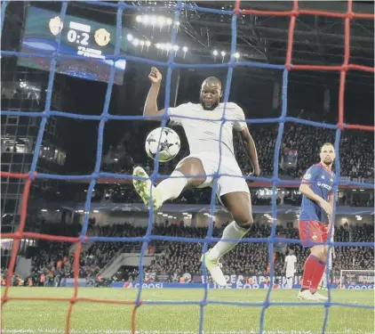  ??  ?? 2 Manchester United striker Romelu Lukaku scores his second and his side’s third goal against CSKA Moscow.