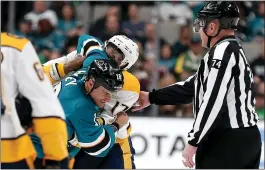  ?? ANDA CHU — STAFF PHOTOGRAPH­ER ?? The Sharks’ Michael Haley (18) and Nashville Predators’ Wayne Simmonds (17) fight it out in the first period of NHL action Saturday night at SAP Center.