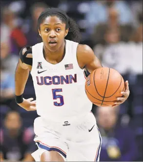  ?? Jessica Hill / Associated Press ?? UConn’s Crystal Dangerfiel­d dribbles during an exhibition game earlier this month.