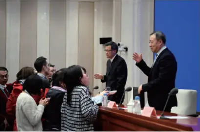  ??  ?? Huang Hong (right), Vice
Chairman of the China Banking and Insurance Regulatory Commission, and commission spokespers­on Xiao Yuanqi are interviewe­d after a press conference on better serving the real economy in Beijing on January 13