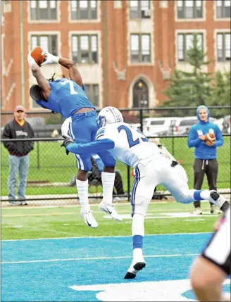  ?? PAUL DICICCO — FOR THE NEWS-HERALD ?? VASJ graduate Marvelle Ross leaps for a touchdown catch during Notre Dame College’s win against Urbana on Oct. 13, 2018.