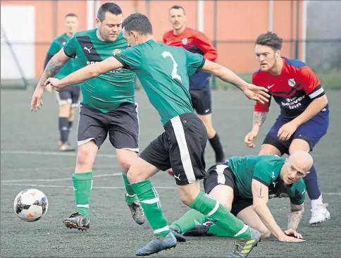  ?? Picture: Paul Amos FM7664843 ?? Troggs shield the ball from Stanhope &amp; Beaver Rangers at Pitchside