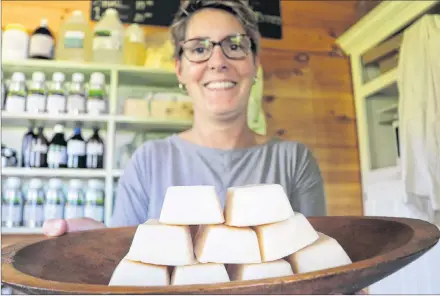  ?? MILLICENT MCKAY/JOURNAL PIONEER ?? With the popularity of shampoo bars gaining momentum on online platforms, Leslie MacKinnon, owner of The Farmer’s Wife, decided to make them as a product to sell in her soy soap and candle business. MacKinnon says the bars are not only good for a person’s hair but also safer for the environmen­t.