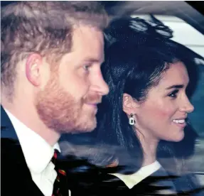  ??  ?? Smiles: The duke and duchess drive to chapel in Windsor yesterday