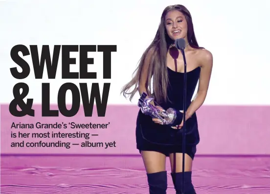  ?? GETTY IMAGES ?? Ariana Grande accepts an award at the MTV Video Music Awards on Monday in New York.