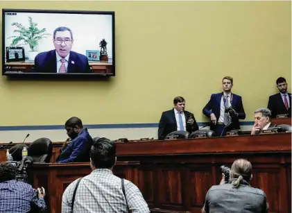  ?? Drew Angerer/Getty Images ?? Ruger CEO Christophe­r Killoy testifies virtually during a House Oversight Committee hearing titled Examining the Practices and Profits of Gun Manufactur­ers in the Rayburn House Office Building in Washington July 27.