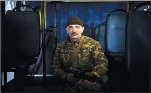  ?? ?? Yaroslav Ignatyuk, a 58-year-old aviation radio engineer who has a wife and two daughters, says he is volunteeri­ng as a fighter in Ukraine to protect his family.