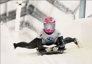  ?? Roman Koksarov / Associated Press ?? Russia’s Yulia Kanakina reacts after finishing a run in the women’s skeleton World Cup race in Latvia on Friday. She lost to Austria’s Janine Flock by 0.17 seconds.