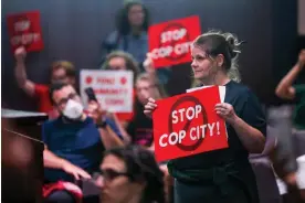  ?? ?? People protest the Atlanta Public Safety Training Center, which critics call ‘Cop City’, in Atlanta on 6 June 2023. Photograph: Jason Getz/Atlanta Journal-Constituti­on via AP