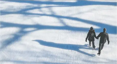  ?? ERROL MCGIHON ?? People enjoy the sun during a skate on the Rideau Canal on Thursday ahead of Winterlude, which kicks off today.