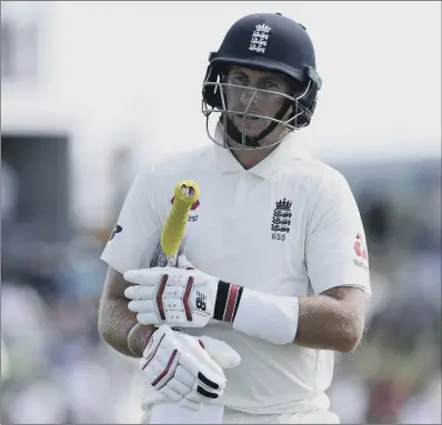  ?? PICTURE: AP PHOTO/MARK BAKER ?? POOR START: England captain Joe Root walks from the field after being dismissed for two during day one of the first Test.