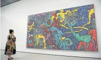  ?? Pictures: SAUL LOEB / AFP ?? COLOURFUL CANVAS: A visitor looks at ‘Untitled’, by artist Keith Haring, at the Pavilions, a building at the Glenstone Museum, in Maryland.