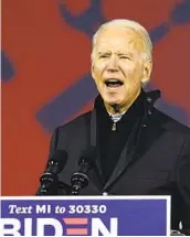  ?? CAROLYN KASTER AP ?? Former Vice President Joe Biden speaks Friday at Michigan State Fairground­s in Novi, Mich.