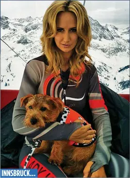  ??  ?? PUPPY LOVE: Lady Victoria with D’Artagnan, her well-travelled Norfolk terrier
INNSBRUCK...