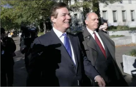  ?? ALEX BRANDON — THE ASSOCIATED PRESS ?? Paul Manafort leaves Federal District Court in Washington, Monday. Manafort, President Donald Trump’s former campaign chairman, and Manafort’s business associate Rick Gates have pleaded not guilty to felony charges of conspiracy against the United...