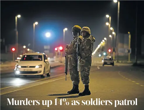  ?? Picture: Gallo Images/Netwerk24/Jaco Marais ?? Soldiers patrol the streets of Kraaifonte­in, one of the areas where the highest number of murders and gang-related shootings occur. The army’s deployment is expected to end tomorrow.