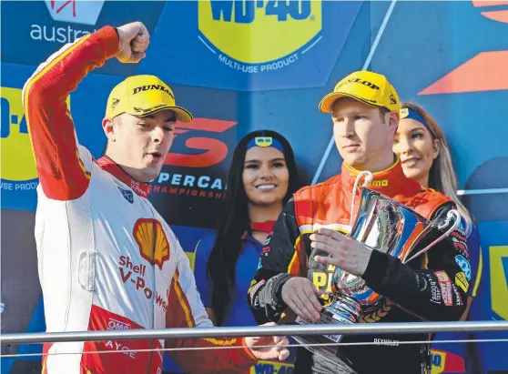  ?? LIVING THE DREAM: Scott McLaughlin ( left) celebrates on the podium after winning yesterday at Phillip Island. Picture: AAP ??