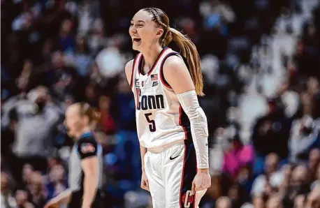  ?? Jessica Hill/Associated Press ?? UConn guard Paige Bueckers smiles during Monday’s win over Georgetown in the Big East championsh­ip at Mohegan Sun Arena.