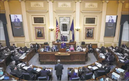  ?? Drew Angerer / Getty Images ?? A view inside the House of Delegates chamber as Virginia Speaker of the House Kirk Cox presides over a session at the Virginia State Capitol on Thursday in Richmond, Va. Virginia state politics are in a state of upheaval, with Gov. Ralph Northam and state Attorney General Mark Herring both admitting to past uses of blackface and Lt. Gov. Justin Fairfax accused of sexual misconduct.