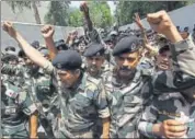  ?? AFP ?? BSF jawans shout slogans after honouring their fallen comrades in Jammu on Wednesday