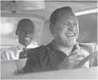  ?? UNIVERSAL PICTURES ?? Tony Lip (Viggo Mortensen, right) introduces Don Shirley (Mahershala Ali) to Kentucky Fried Chicken in “Green Book.”