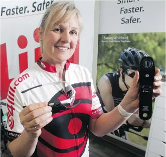  ?? TED RHODES ?? Victoria Brilz, chief business developmen­t officer at 4iiii Innovation­s in Cochrane, holds the company’s Precision Power Meter and Sportiiii, devices which help monitor athlete performanc­e.