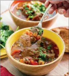  ??  ?? Instant Pot Mediterran­ean lamb stew. This dish is from a recipe by Katie Workman.