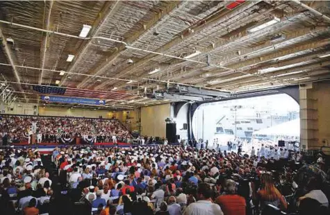  ?? Reuters ?? President Donald Trump at the commission­ing ceremony of the aircraft carrier USS Gerald R. Ford at Naval Station Norfolk Saturday. Passage of the Russia sanctions bill could put Capitol Hill on possible collision course with Trump.