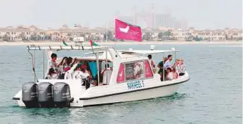  ?? Courtesy: Friends of Cancer Patients ?? Pictures from last year’s pink skydive. The event features a pink regatta with five Nakheel boats carrying the message of breast cancer awareness along the Arabian Gulf from 8.30 to 9.30am on October 31.