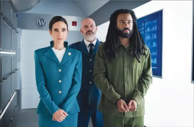  ??  ?? Jennifer Connelly, Mike O’Malley and Daveed Diggs in “Snowpierce­r”
