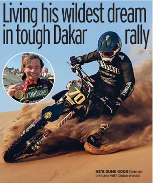  ?? ?? HE’S DUNE GOOD Oran on bike and with Dakar medal