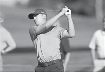  ?? The Associated Press ?? Jordan Spieth hits a fairway shot on the 12th hole during the first round of play at The Barclays.