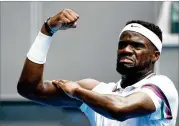  ?? MARK KOLBE / GETTY IMAGES ?? American Frances Tiafoe celebrates winning match point against South Africa’s Kevin Anderson in the second round Wednesday.